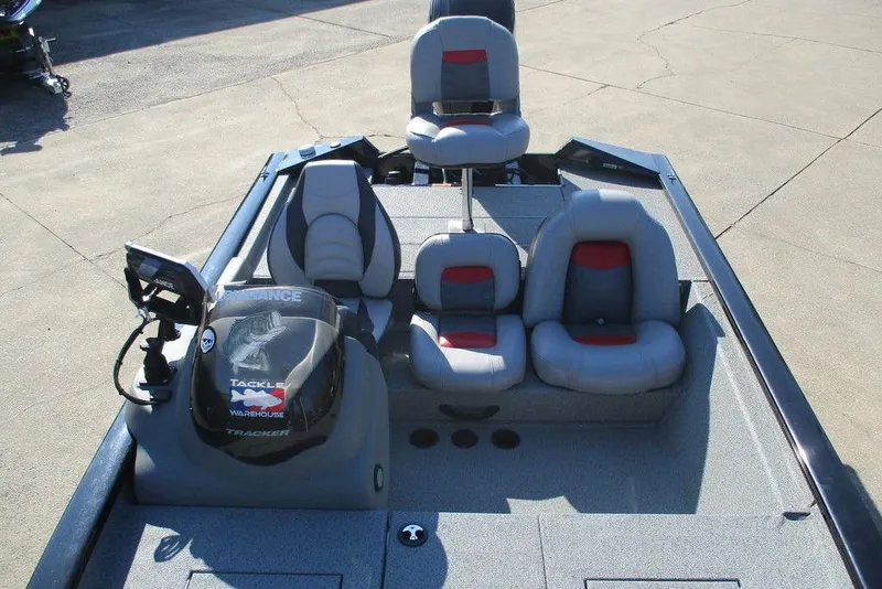 Slide: The Image of 2017 Tracker Pro Team 175 TXW boat interior with seating and control panel. - 7