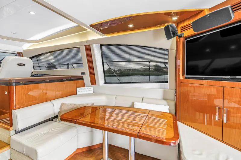 Slide: The Image of Luxurious interior of 2016 Sea Ray 510 Fly yacht with sleek wood finishes and modern amenities. - 14