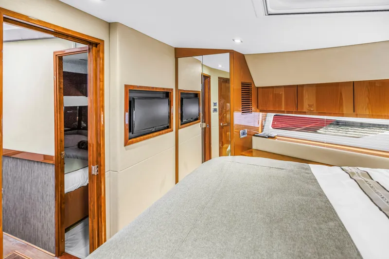 Slide: The Image of Luxurious interior of 2016 Sea Ray 510 Fly yacht with modern amenities and elegant design. - 27