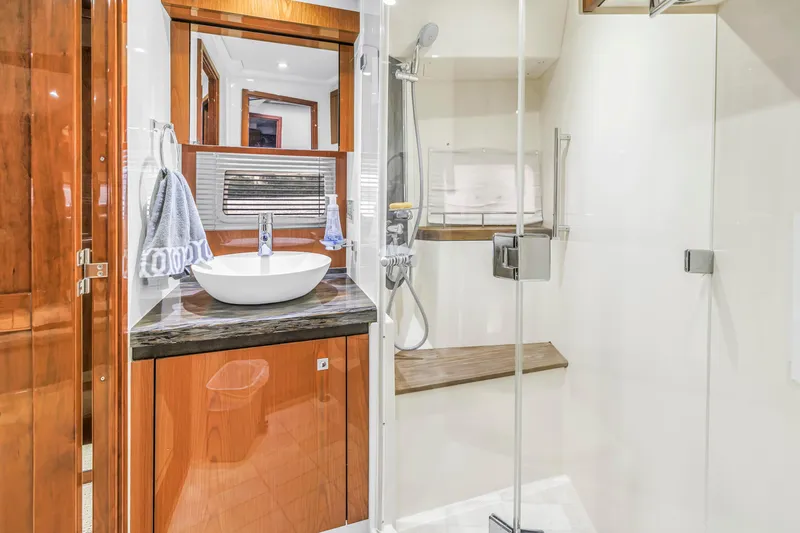 Slide: The Image of Luxurious bathroom interior of 2016 Sea Ray 510 Fly yacht with modern fixtures. - 30