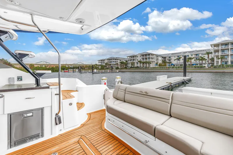 Slide: The Image of Luxurious 2016 Sea Ray 510 Fly yacht interior with waterfront view and modern amenities. - 46