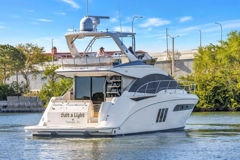 Slide: The Image of 2016 Sea Ray 510 Fly yacht cruising in Tampa, Florida waters. - 5