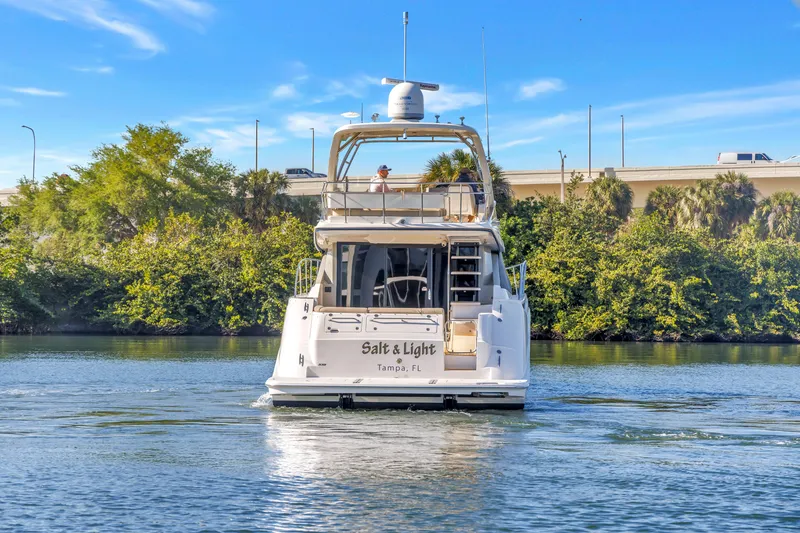 Slide: The Image of 2016 Sea Ray 510 Fly yacht cruising on a sunny day in Tampa, Florida. - 6