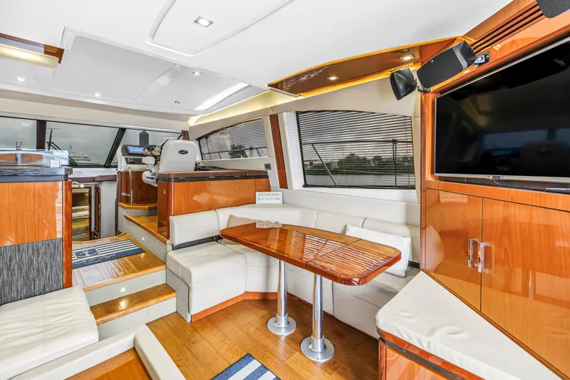 Slide: The Image of Luxurious interior of 2016 Sea Ray 510 Fly yacht with elegant seating and modern amenities. - 13