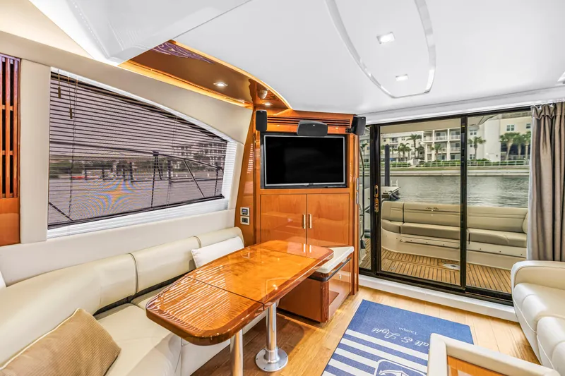 Slide: The Image of Luxurious interior of 2016 Sea Ray 510 Fly yacht with elegant seating and waterfront view. - 19