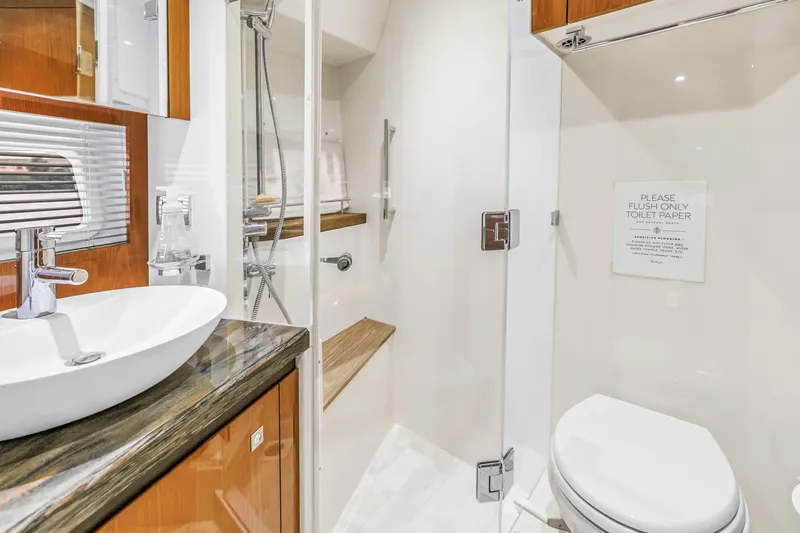 Slide: The Image of Luxurious bathroom in 2016 Sea Ray 510 Fly yacht with modern fixtures and shower. - 29