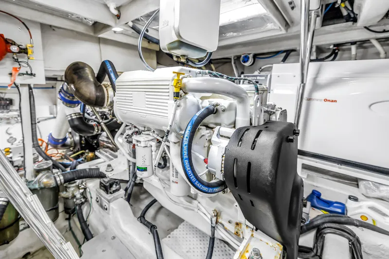 Slide: The Image of Engine room of 2016 Sea Ray 510 Fly yacht, showcasing mechanical components. - 55