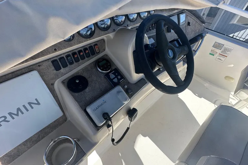Slide: The Image of Helm of 2005 Carver 360 Sport Sedan with Garmin navigation system and steering wheel. - 11