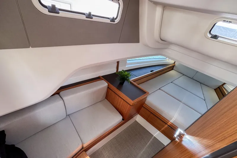 Slide: The Image of Luxurious interior of 2025 Aiata Wayfinder 38 Cabin with modern seating and wood accents. - 29