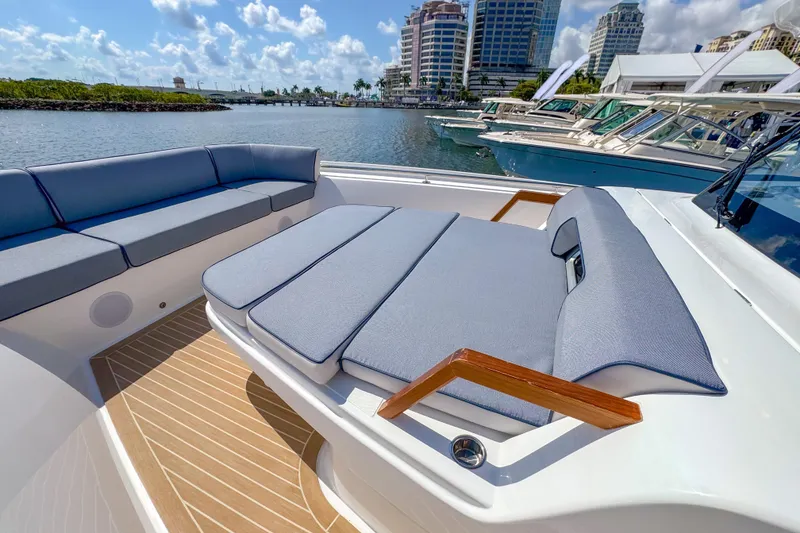 Slide: The Image of Luxurious seating on 2025 Aiata Wayfinder 38 Cabin yacht, docked in a marina. - 33