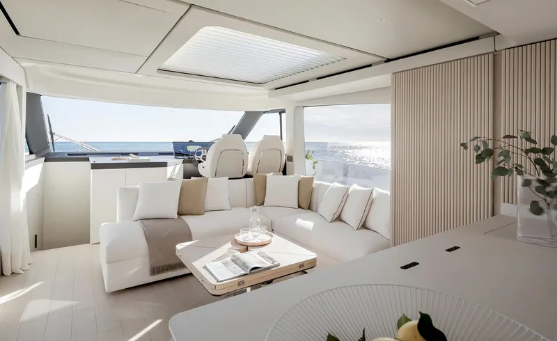 Slide: The Image of Luxurious interior of 2025 Azimut Seadeck 6 yacht with modern seating and ocean view. - 12
