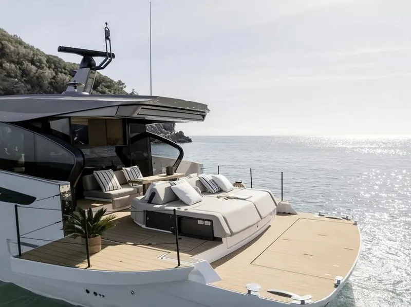 Slide: The Image of 2025 Azimut Seadeck 6 yacht with luxurious deck and ocean view. - 3