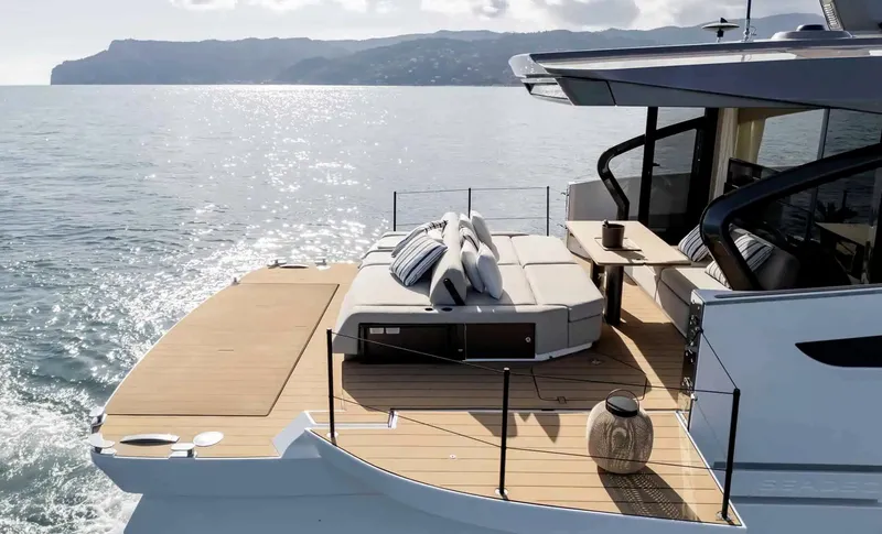 Slide: The Image of Azimut Seadeck 6 yacht, 2025 model, featuring a luxurious deck with ocean view. - 7