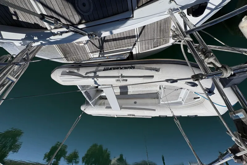 Slide: The Image of Overhead view of a 1990 Beneteau Oceanis 500 with an inflatable dinghy. - 42