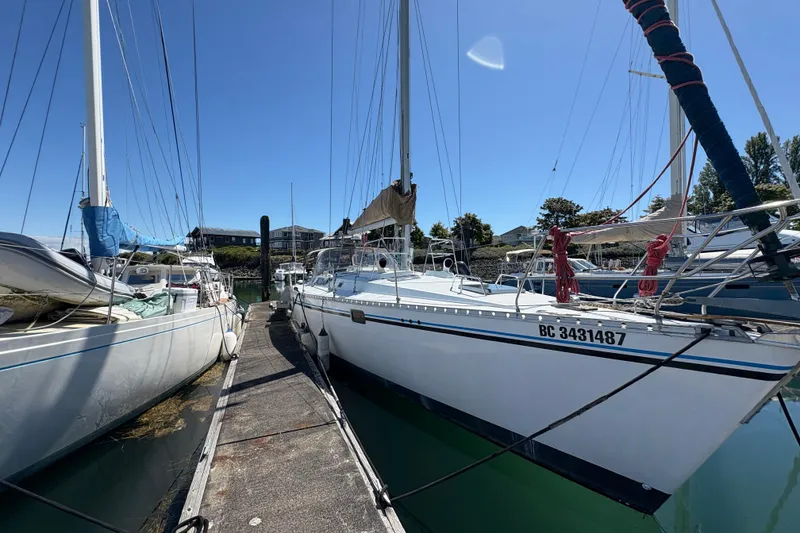 Slide: The Image of Sailboat docked at marina, Beneteau Oceanis 500, 1990 model, sunny day. - 6