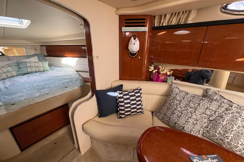 Slide: The Image of Interior of 2003 Sea Ray 360 Sundancer with cozy seating and elegant decor. - 28
