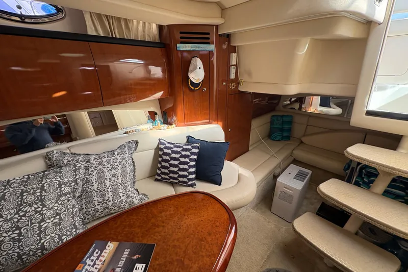Slide: The Image of Luxurious interior of 2003 Sea Ray 360 Sundancer yacht with elegant seating and decor. - 30
