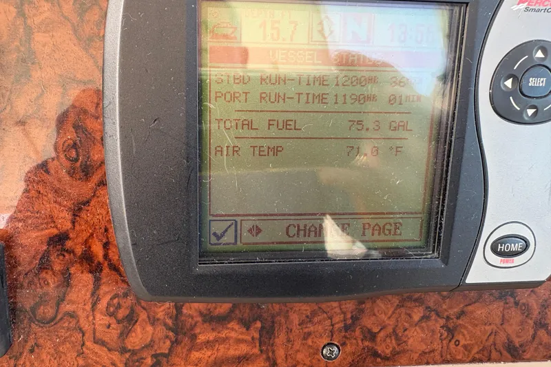 Slide: The Image of Display panel of a 2003 Sea Ray 360 Sundancer showing vessel status and fuel levels. - 49