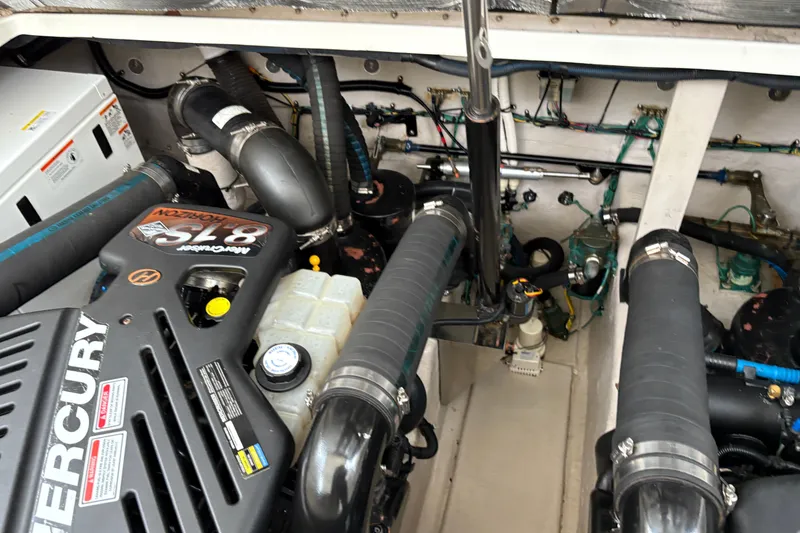 Slide: The Image of Engine room of a 2003 Sea Ray 360 Sundancer with Mercury components. - 55