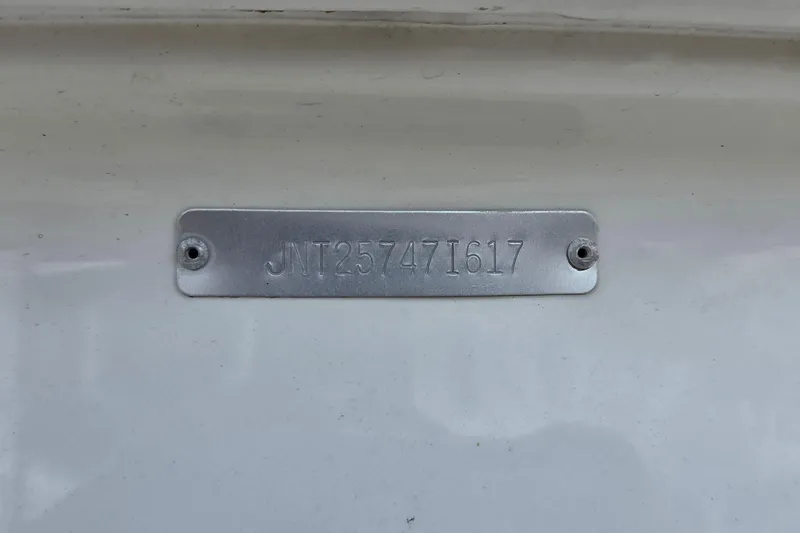 Slide: The Image of Metal identification plate on 2017 NauticStar 203DC Sport Deck boat. - 16