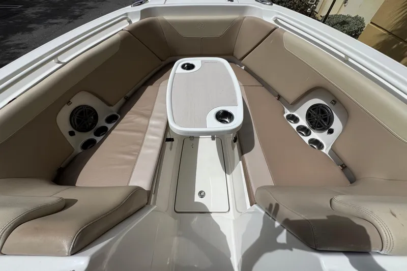 Slide: The Image of Livewell on a 2018 Sailfish 275 DC boat, featuring a clear lid and latch. - 25
