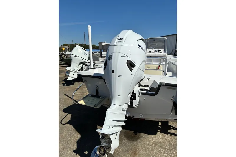 Slide: The Image of 2024 ALK2 Powerboats 21BHX with powerful outboard motor in a sunny marina. - 4