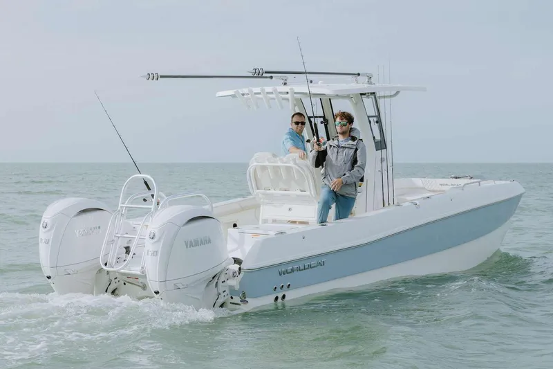 Slide: The Image of Manufacturer Provided Image: 2026 World Cat 235 TE boat cruising with two people on board. - 3