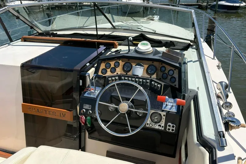Slide: The Image of Engine compartment of a 1986 Wellcraft 3200 St. Tropez boat, featuring a Kohler generator. - 15