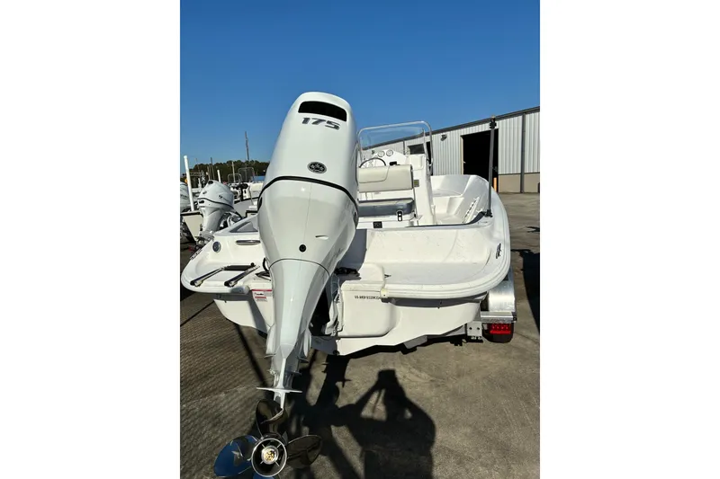 Slide: The Image of 2024 ALK2 Powerboats 22 CRS with 175 HP engine, parked outdoors. - 4