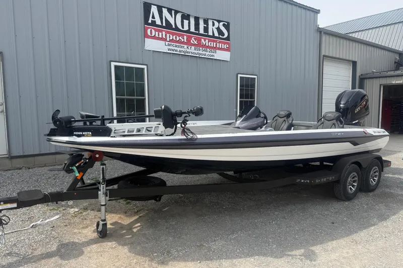 Slide: The Image of 2026 Skeeter ZXR21 SE boat on trailer at Anglers Outpost & Marine. - 3