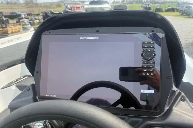 Slide: The Image of Dashboard of a 2026 Skeeter ZXR21 SE with Humminbird Xplore 12 display. - 8