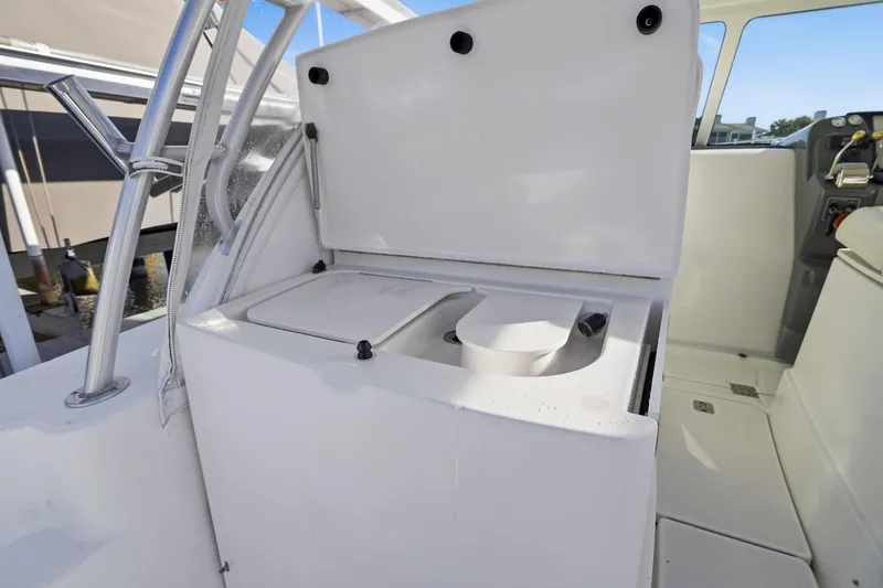 Slide: The Image of 2007 Tiara Yachts 3000 Open boat interior with open storage compartment. - 12