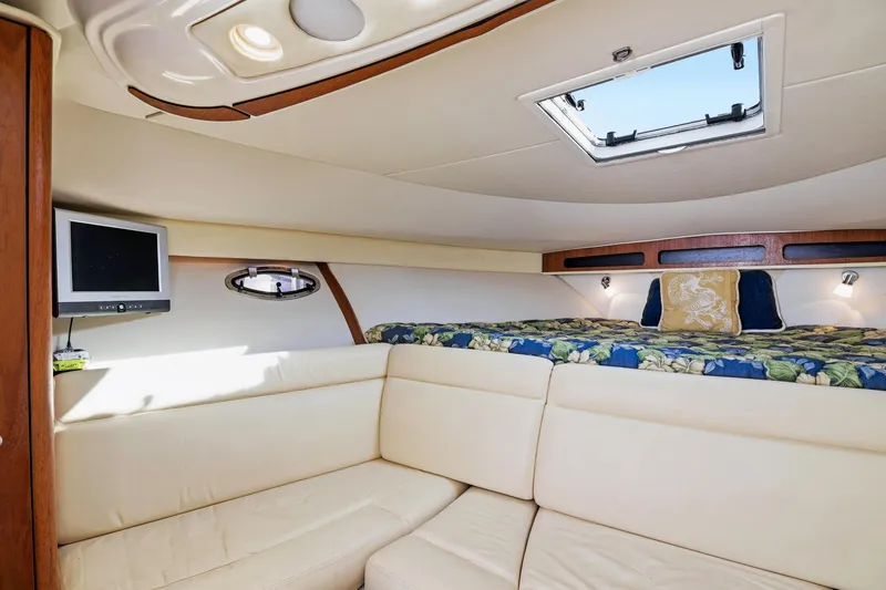 Slide: The Image of Luxurious interior of 2007 Tiara Yachts 3000 Open with cozy seating and elegant decor. - 15