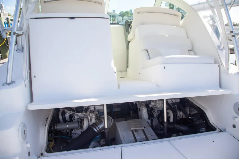 Slide: The Image of 2007 Tiara Yachts 3000 Open engine compartment with seating area above. - 22