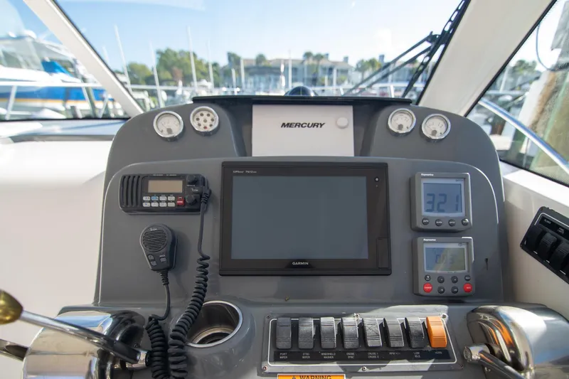 Slide: The Image of Helm of 2007 Tiara Yachts 3000 Open with navigation and communication equipment. - 7