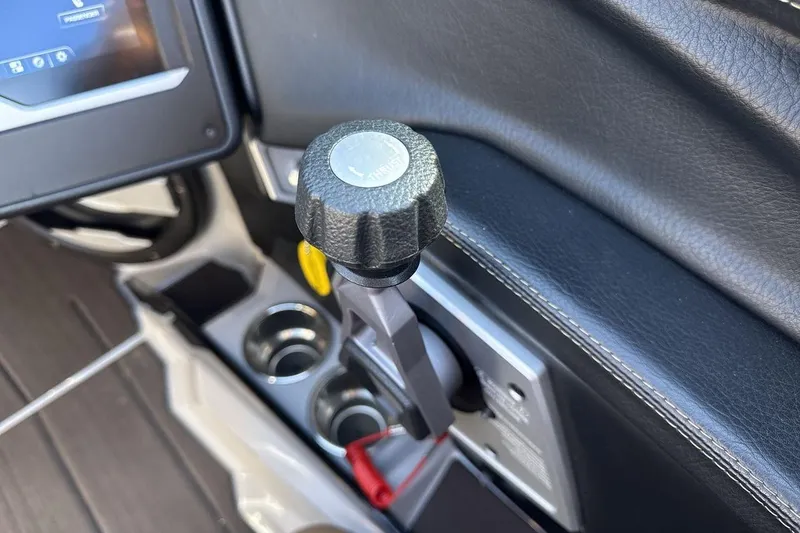 Slide: The Image of 2024 Supra SV interior with gear lever and touchscreen display. - 16