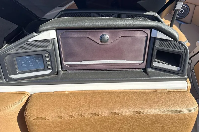 Slide: The Image of 2024 Supra SV dashboard with touchscreen controls and leather accents. - 18