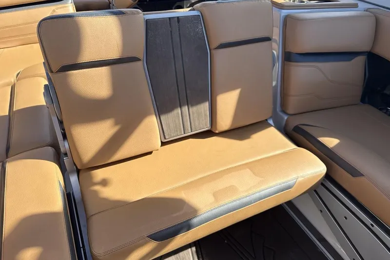 Slide: The Image of 2024 Supra SV interior with tan leather seats and modern design. - 24