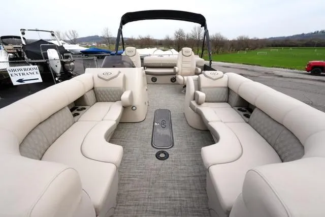Slide: The Image of 2021 Harris Sunliner 230 pontoon boat with spacious seating and elegant interior design. - 8