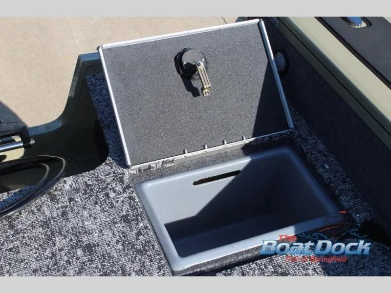 Slide: The Image of Targa V18 Combo 2026 boat with open storage compartment. - 18