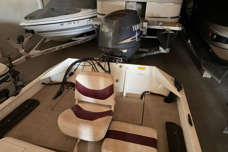 Slide: The Image of 2009 G3 1860 CC Deluxe boat with Yamaha 65 engine in storage. - 11