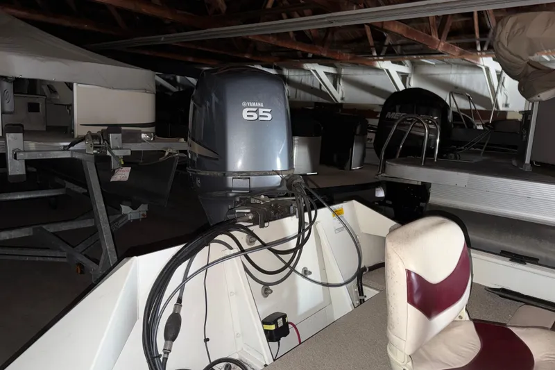 Slide: The Image of 2009 G3 1860 CC Deluxe boat with Yamaha 65 outboard motor in storage. - 17
