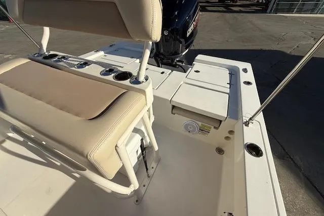 Slide: The Image of 2016 Pathfinder 2200 TRS boat interior with seating and storage compartments. - 10