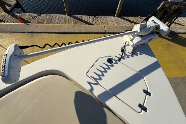 Slide: The Image of Bow of a 2016 Pathfinder 2200 TRS boat with trolling motor at dock. - 15