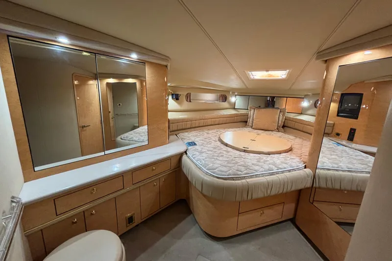 Slide: The Image of Luxurious cabin interior of a 1998 Sea Ray 500 Sundancer yacht with mirrored cabinets. - 18