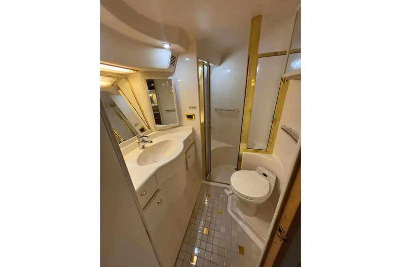Slide: The Image of Luxurious bathroom in 1998 Sea Ray 500 Sundancer yacht with shower and vanity. - 20