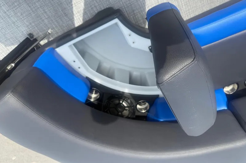 Slide: The Image of 2026 Berkshire 25RFX DC STS boat seat with blue and black upholstery detail. - 12