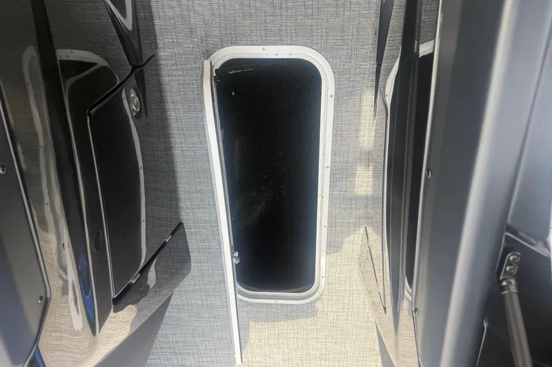 Slide: The Image of Interior view of a 2026 Berkshire 25RFX DC STS boat with sleek design elements. - 15