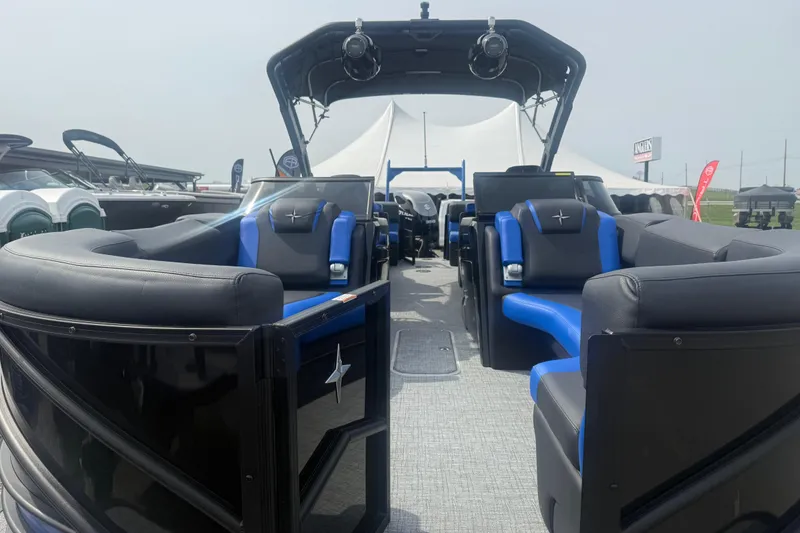 Slide: The Image of 2026 Berkshire 25RFX DC STS pontoon boat with luxurious seating and modern design. - 5