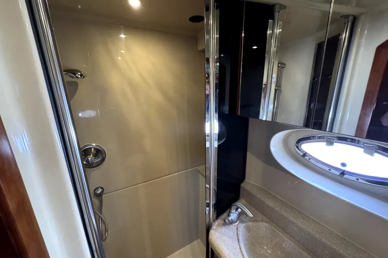 Slide: The Image of Bathroom interior of 2005 Cruisers Yachts 405 Express Motoryacht with shower and sink. - 22